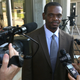Henry McCollum walks out of prison after being released from Central Prison in Raleigh, N.C.